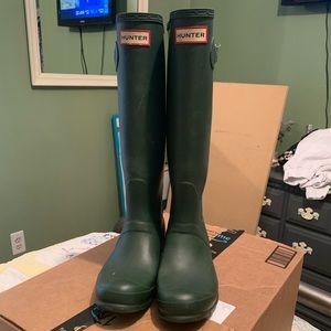 Tall green hunter rain boots